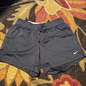 Purple Nike shorts